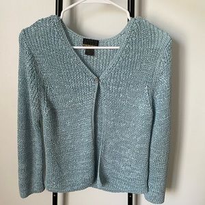 This gorgeous knitted light blue sweater is perfect for spring and summer!